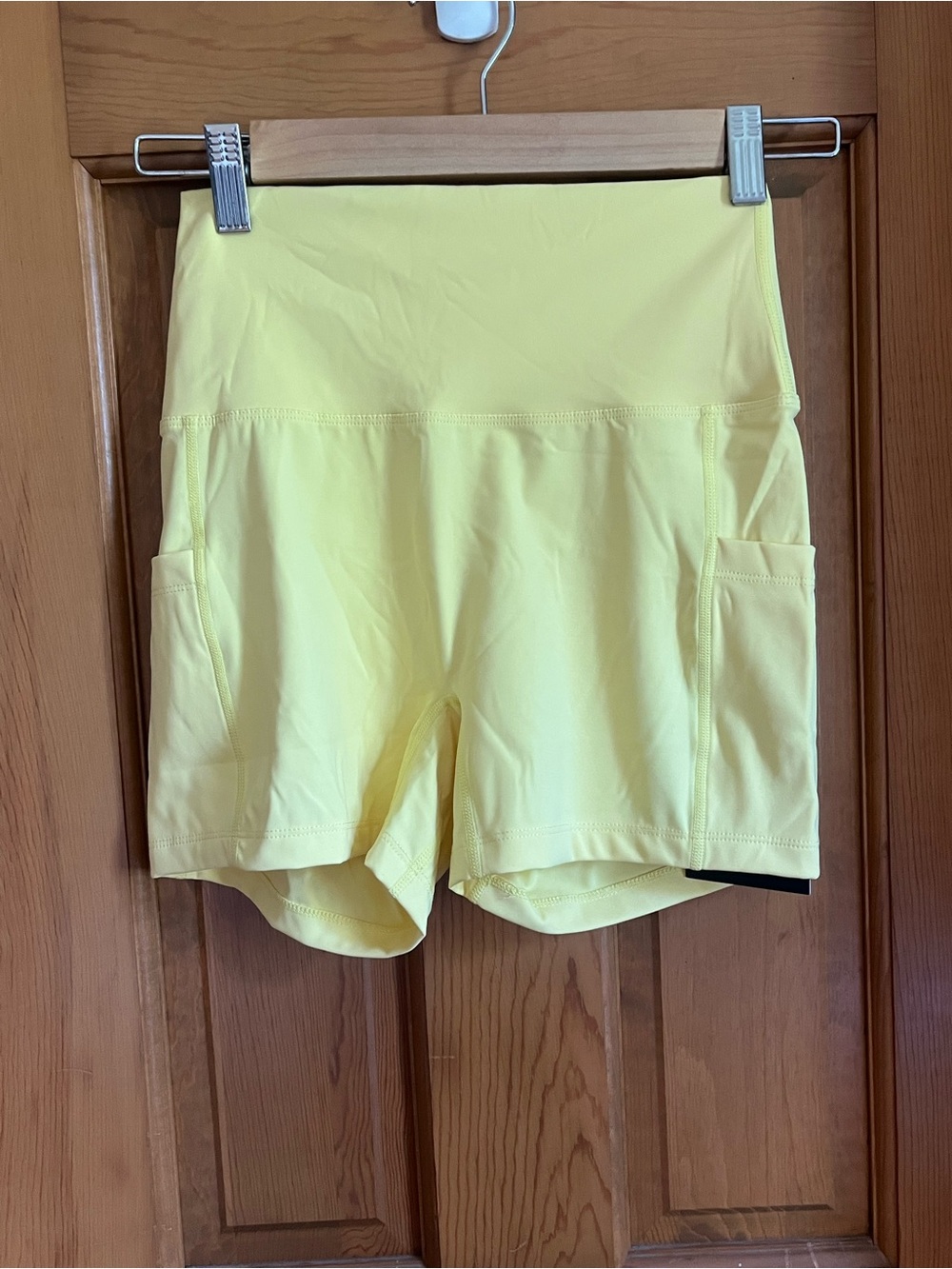 Born Primitive Yellow High-Waist Athletic Shorts with Side Pockets